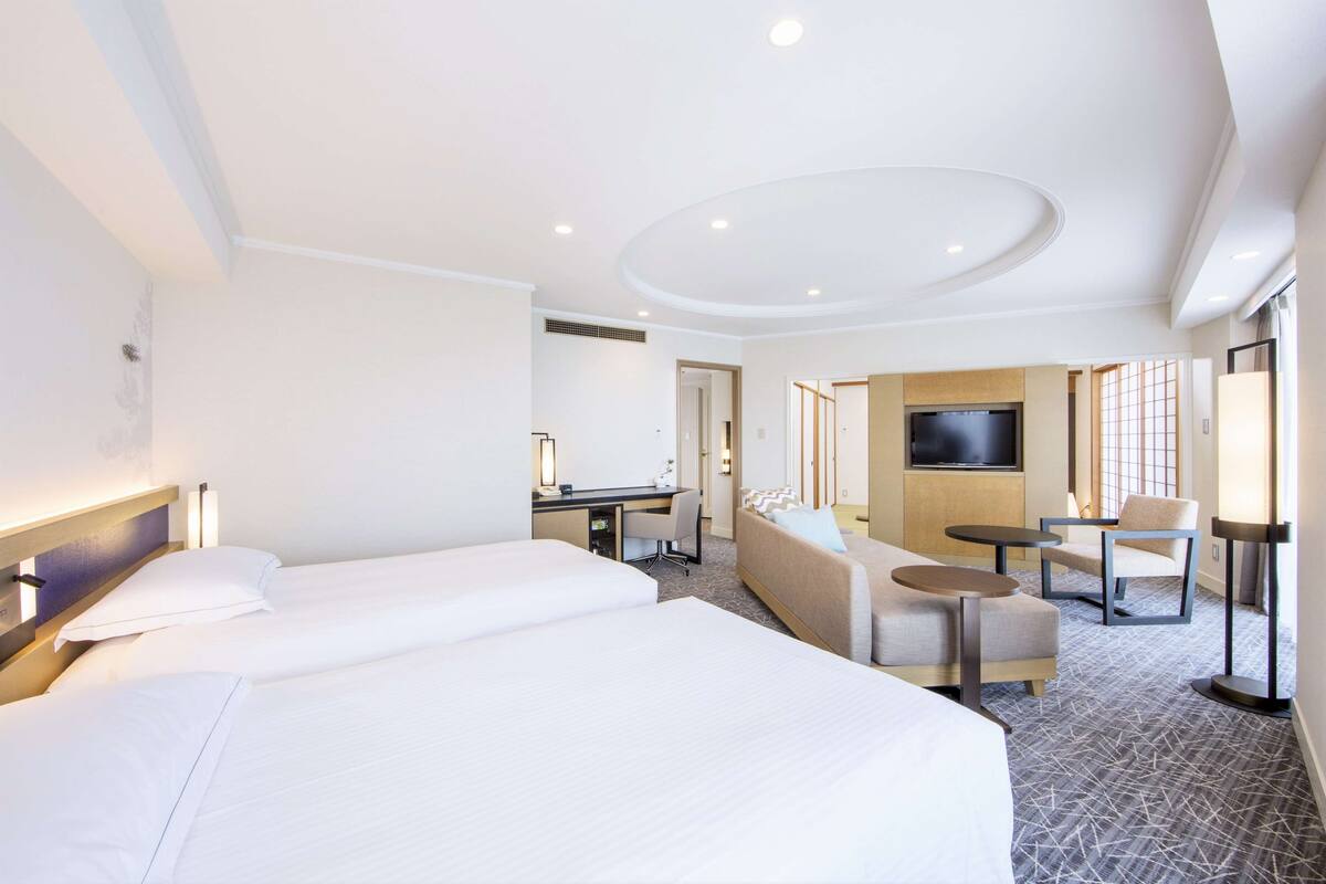 Japanese Western Suite | Living area | 55-inch flat-screen TV with cable channels, TV