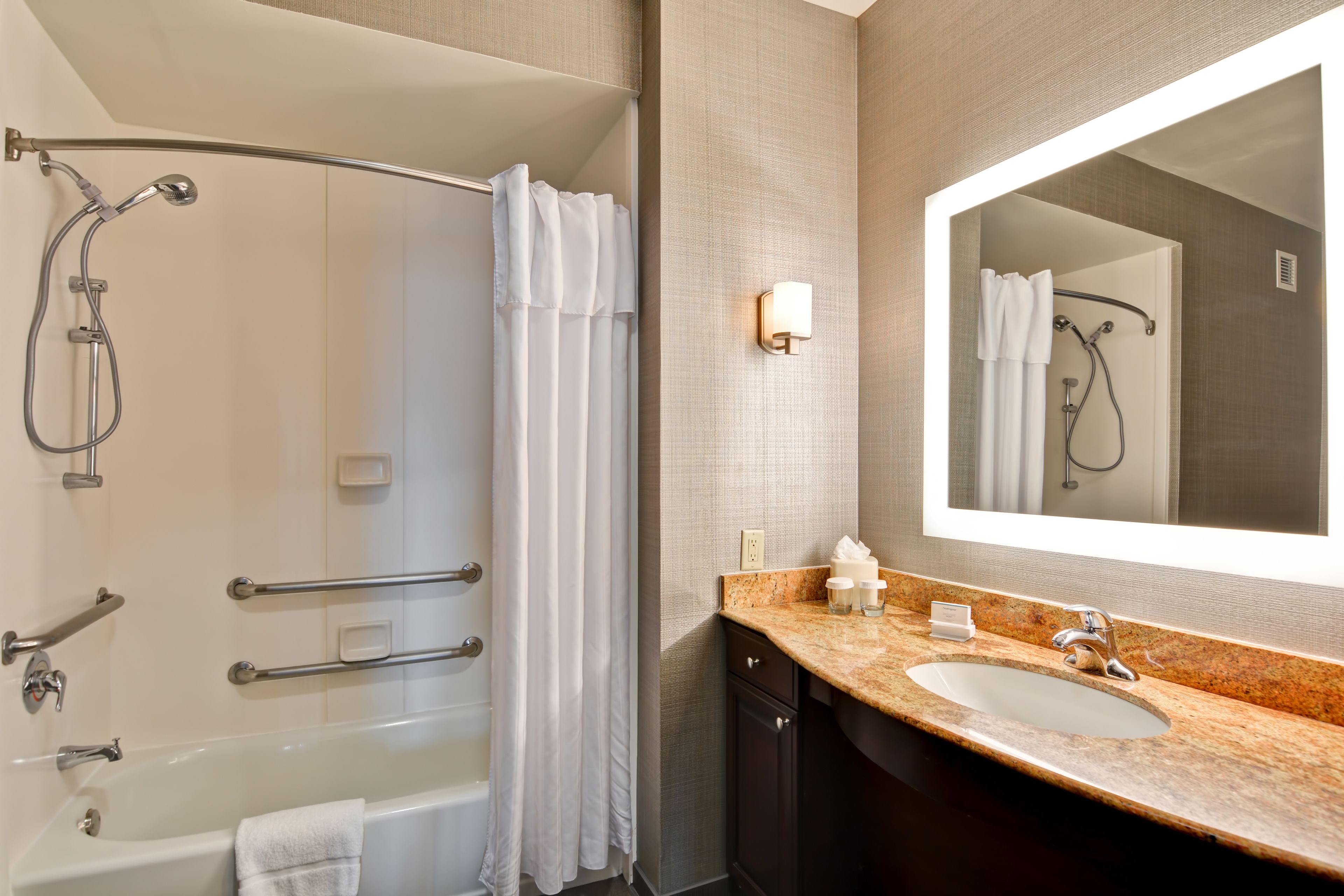 combined shower/bathtub, free toiletries, hair dryer, towels