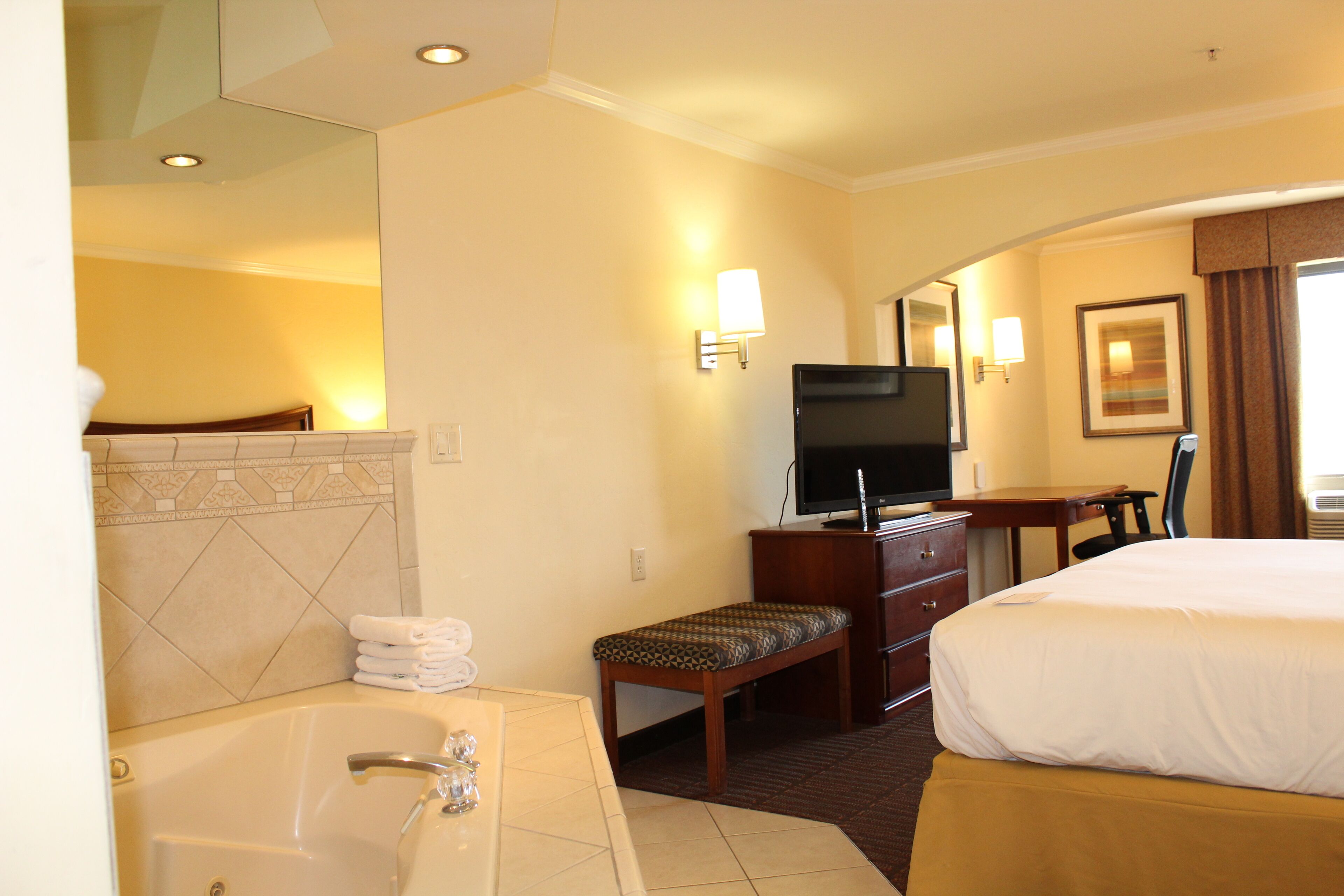 suite, 1 bedroom, jetted tub | premium bedding, down duvets, pillow-top beds, minibar
