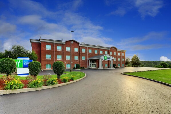 A brick building with a sign for a Holiday Inn Express.
