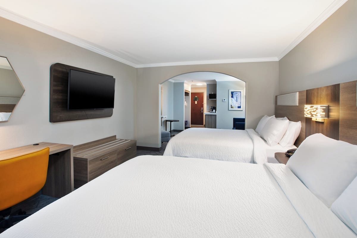Suite, Multiple Beds (Additional Living Area) | Desk, iron/ironing board, free cribs/infant beds, free WiFi