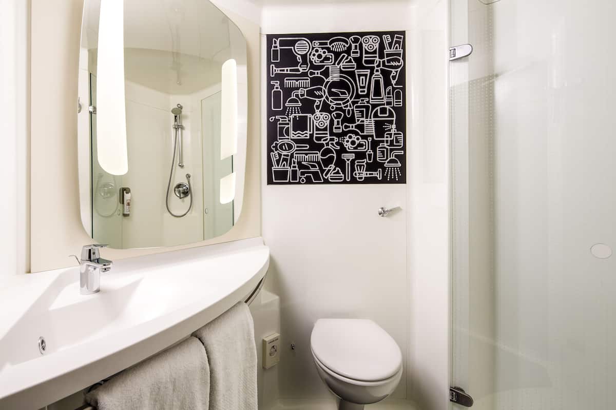 shower, eco-friendly toiletries, hair dryer, towels