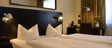 Premium bedding, down duvets, minibar, in-room safe