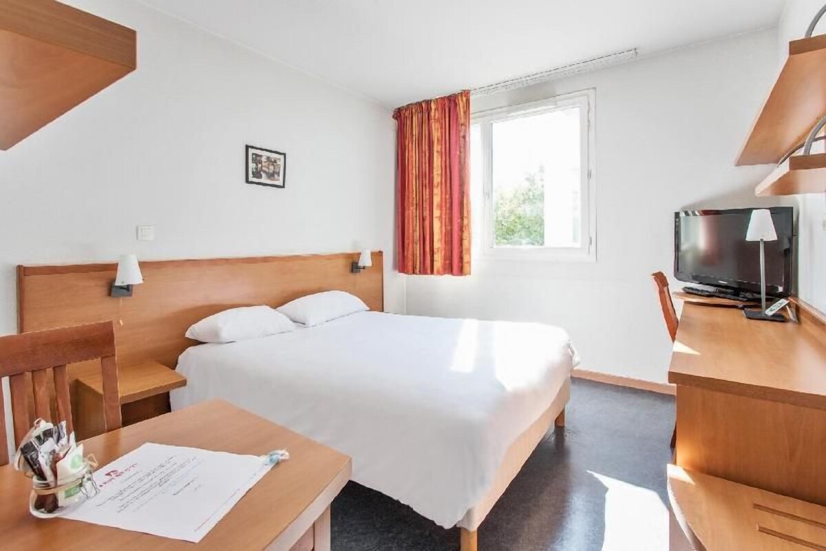 Desk, blackout drapes, iron/ironing board (on request), WiFi (free)