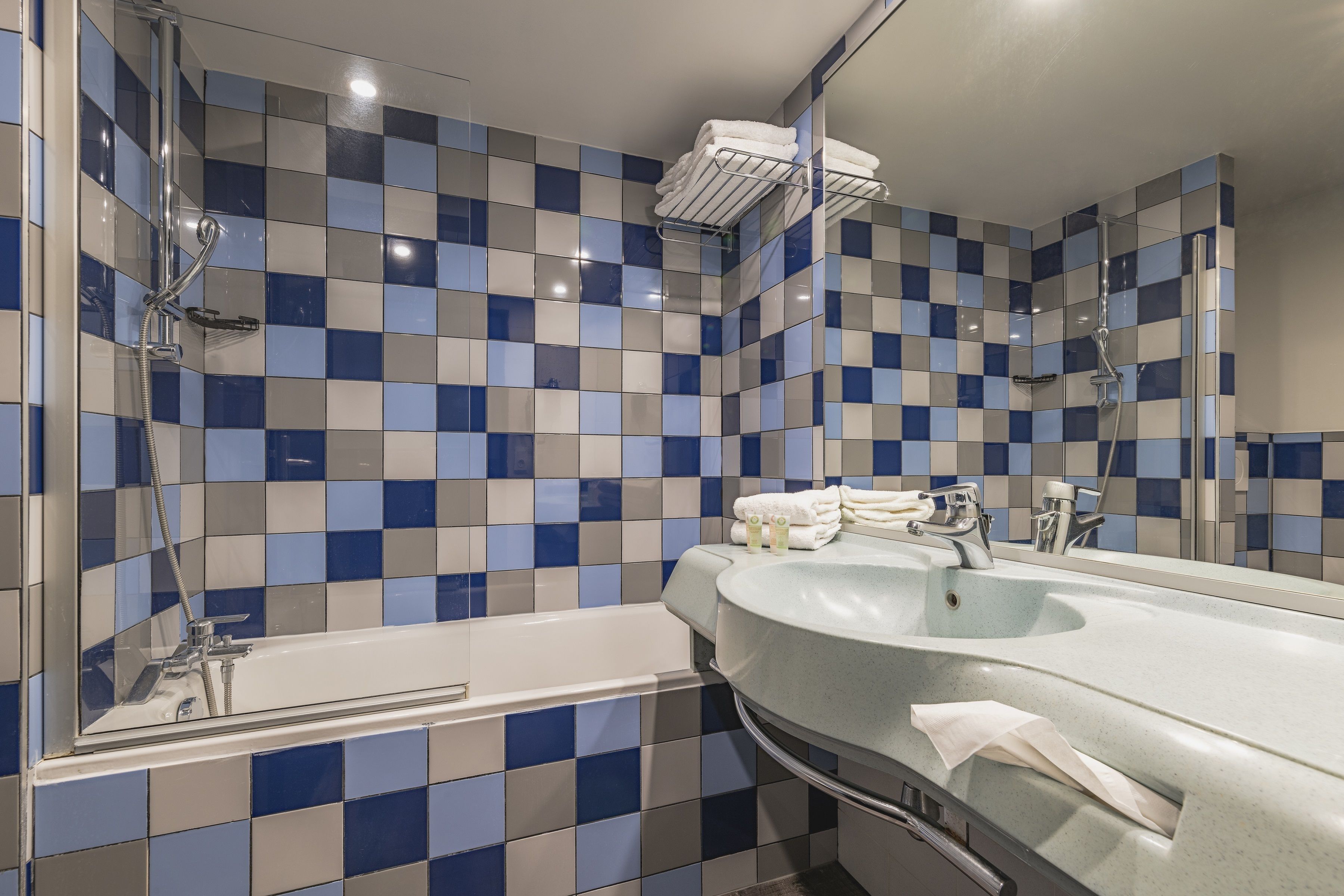 deep-soaking bathtub, free toiletries, hair dryer, towels