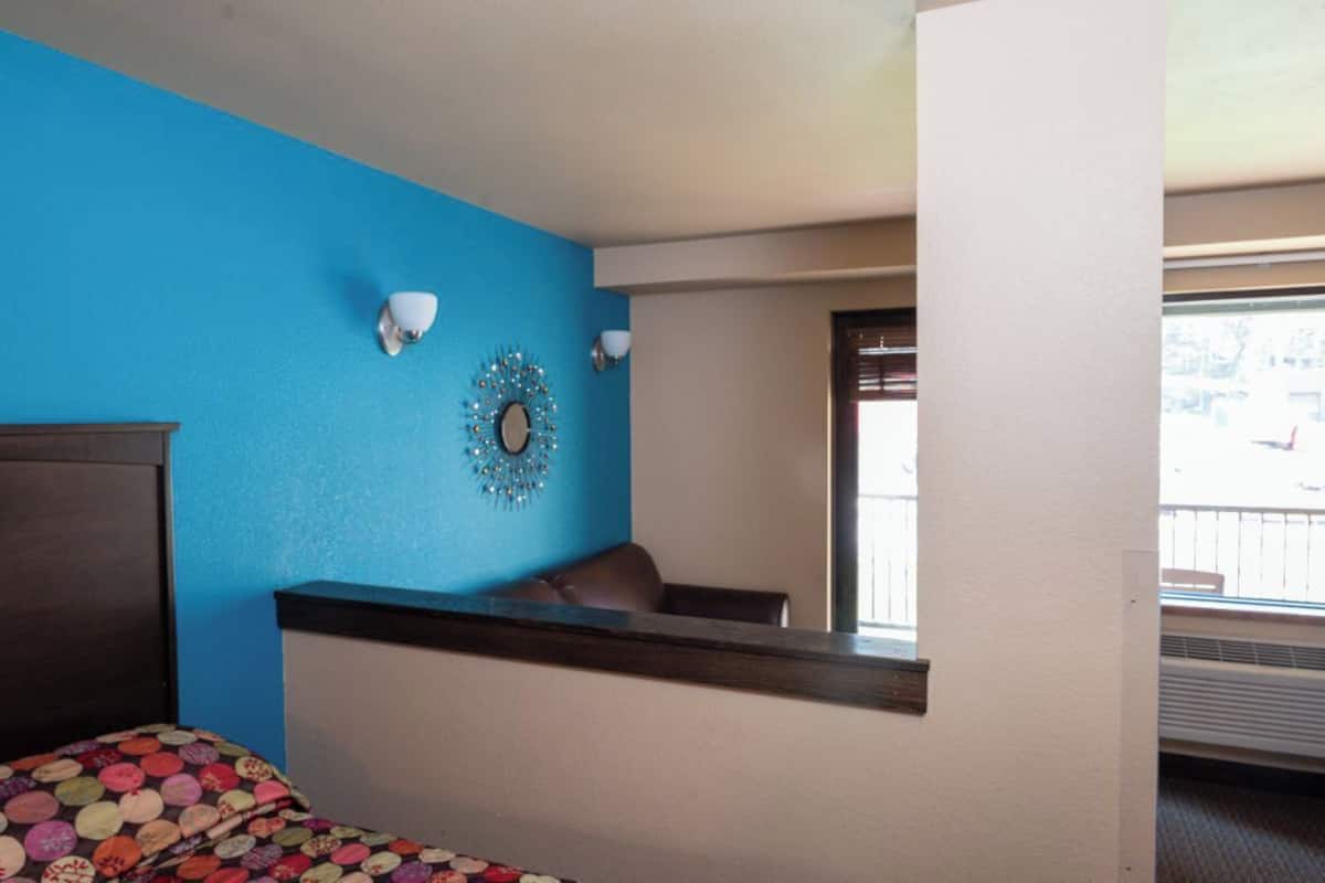 deluxe room, multiple beds | iron/ironing board, wifi, bed sheets