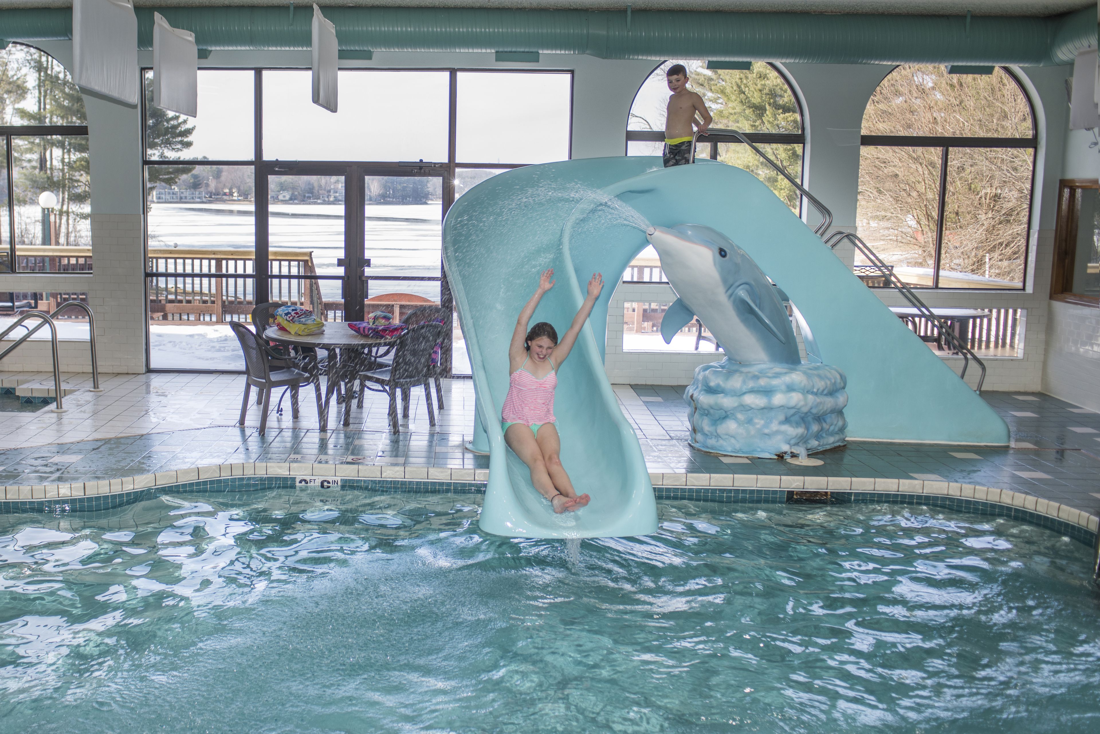 indoor pool, seasonal outdoor pool, pool umbrellas, pool loungers