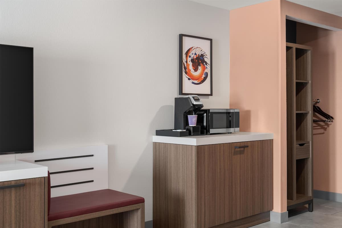 Down duvets, Select Comfort beds, in-room safe, desk