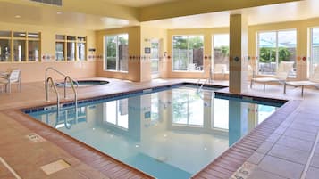 Indoor pool, open 6:00 AM to 10 PM, pool loungers