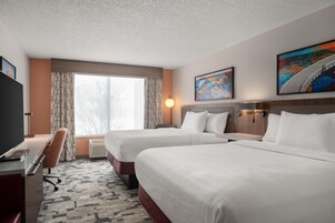 Down comforters, Select Comfort beds, in-room safe, desk