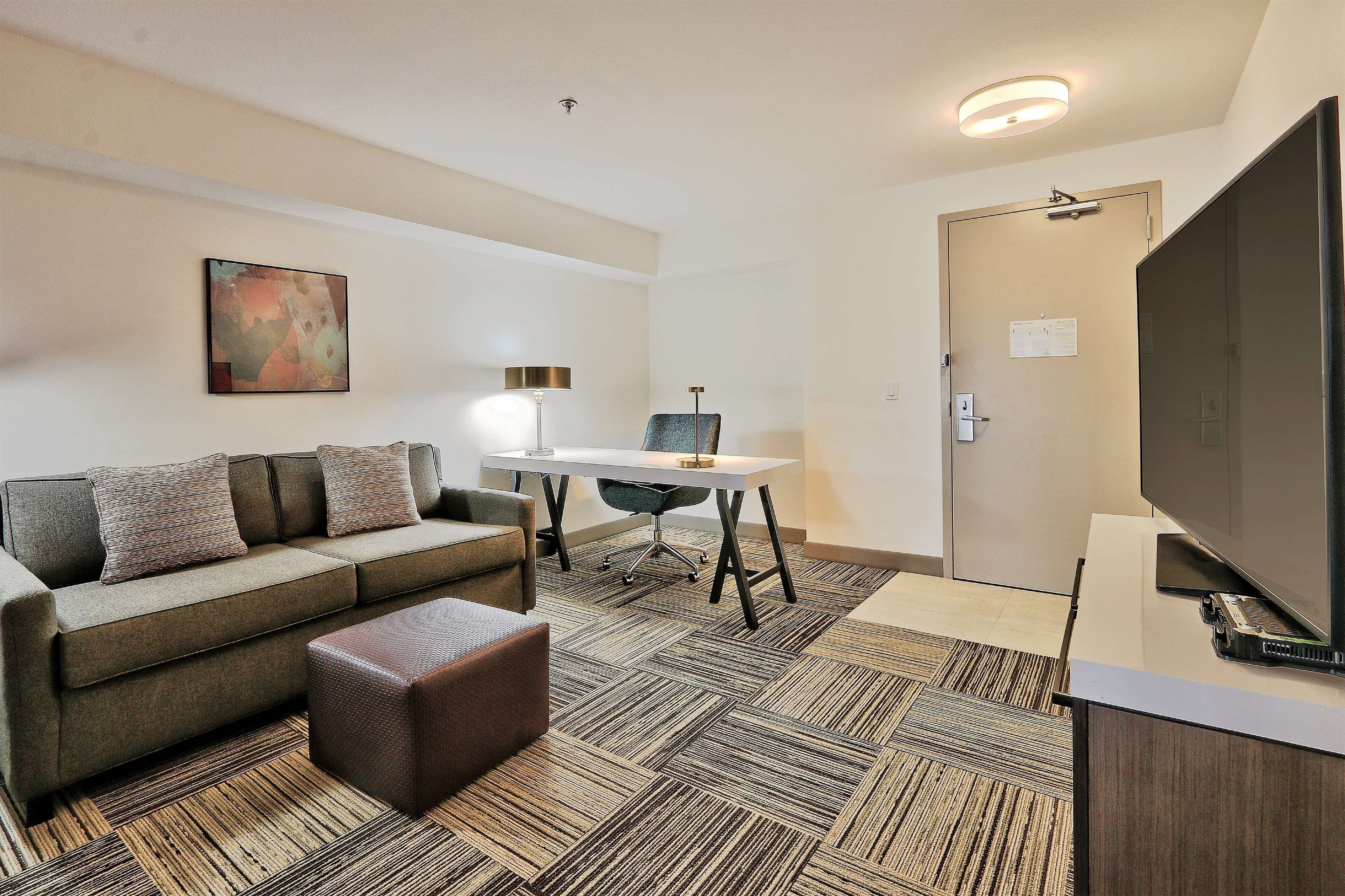 junior suite, one king bed | down duvets, desk, laptop workspace, iron/ironing board