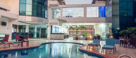 Outdoor pool, pool umbrellas, pool loungers