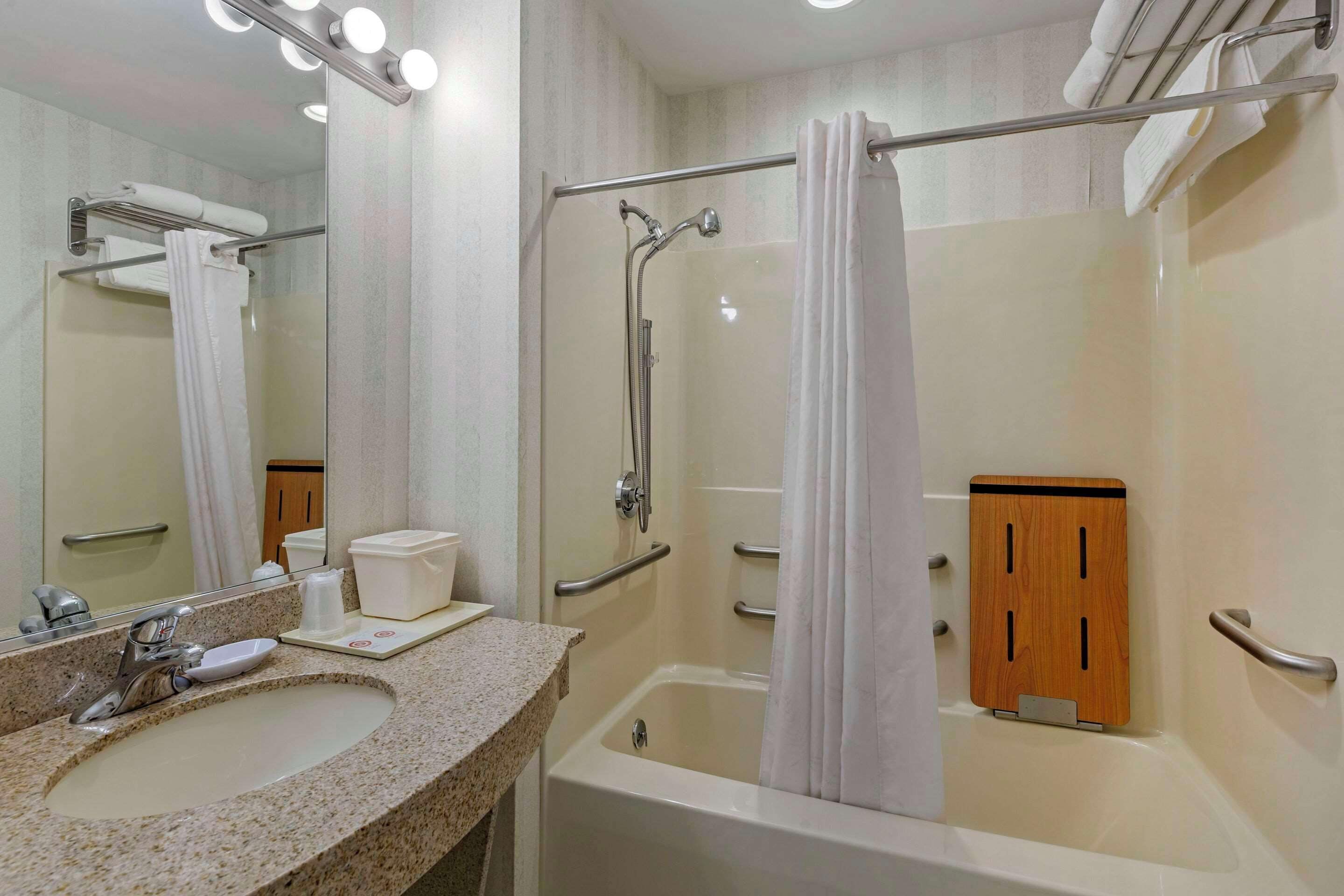 combined shower/bathtub, free toiletries, hair dryer, towels