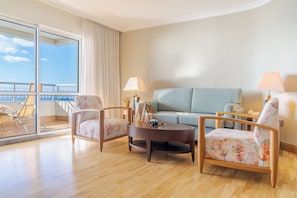 Suite, Sea View | Living area | 32-inch LCD TV with cable channels, TV