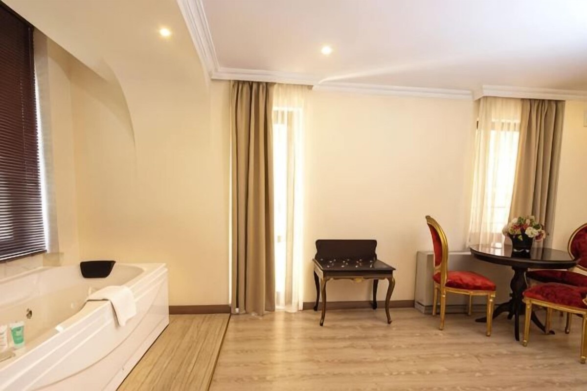 Bathroom | Deep-soaking bathtub, free toiletries, hair dryer, slippers