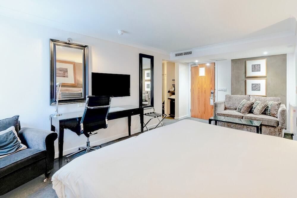 In-room safe, desk, laptop workspace, blackout curtains