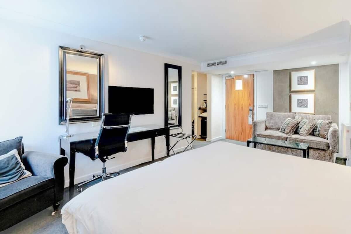 In-room safe, desk, laptop workspace, blackout curtains