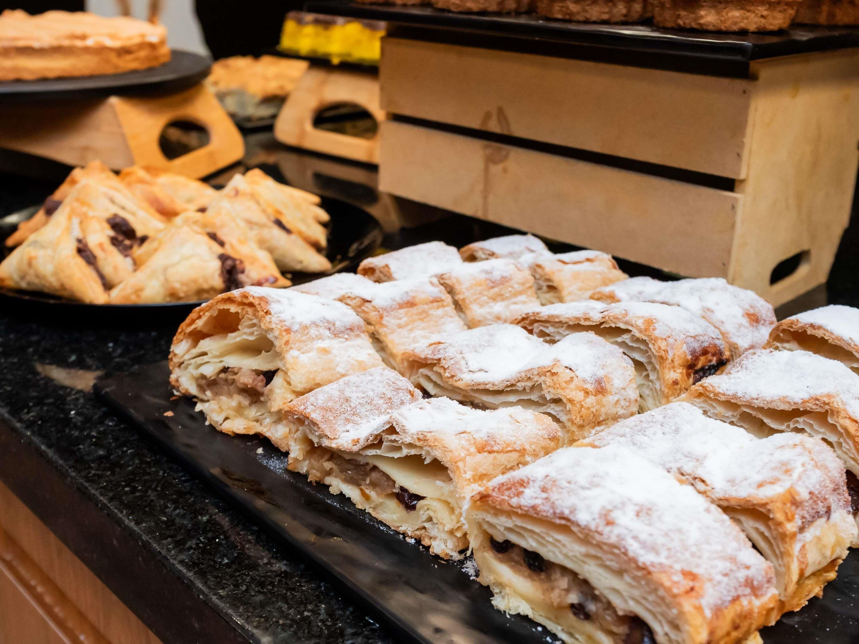A display of pastries on a countertop.