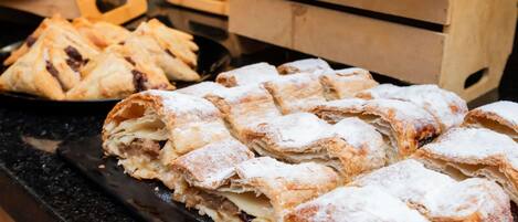 A display of pastries on a countertop.