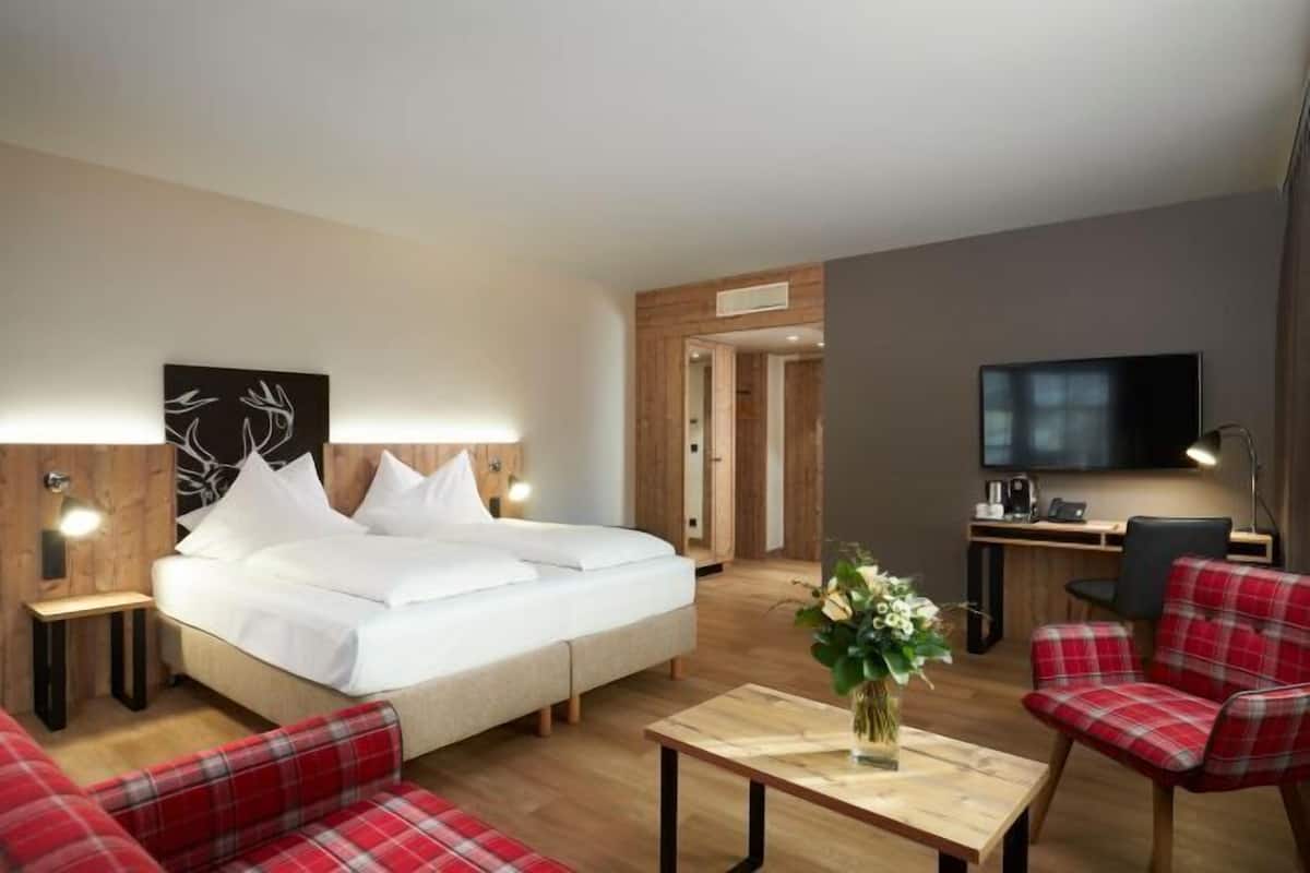 Hypo-allergenic bedding, free minibar, in-room safe, desk