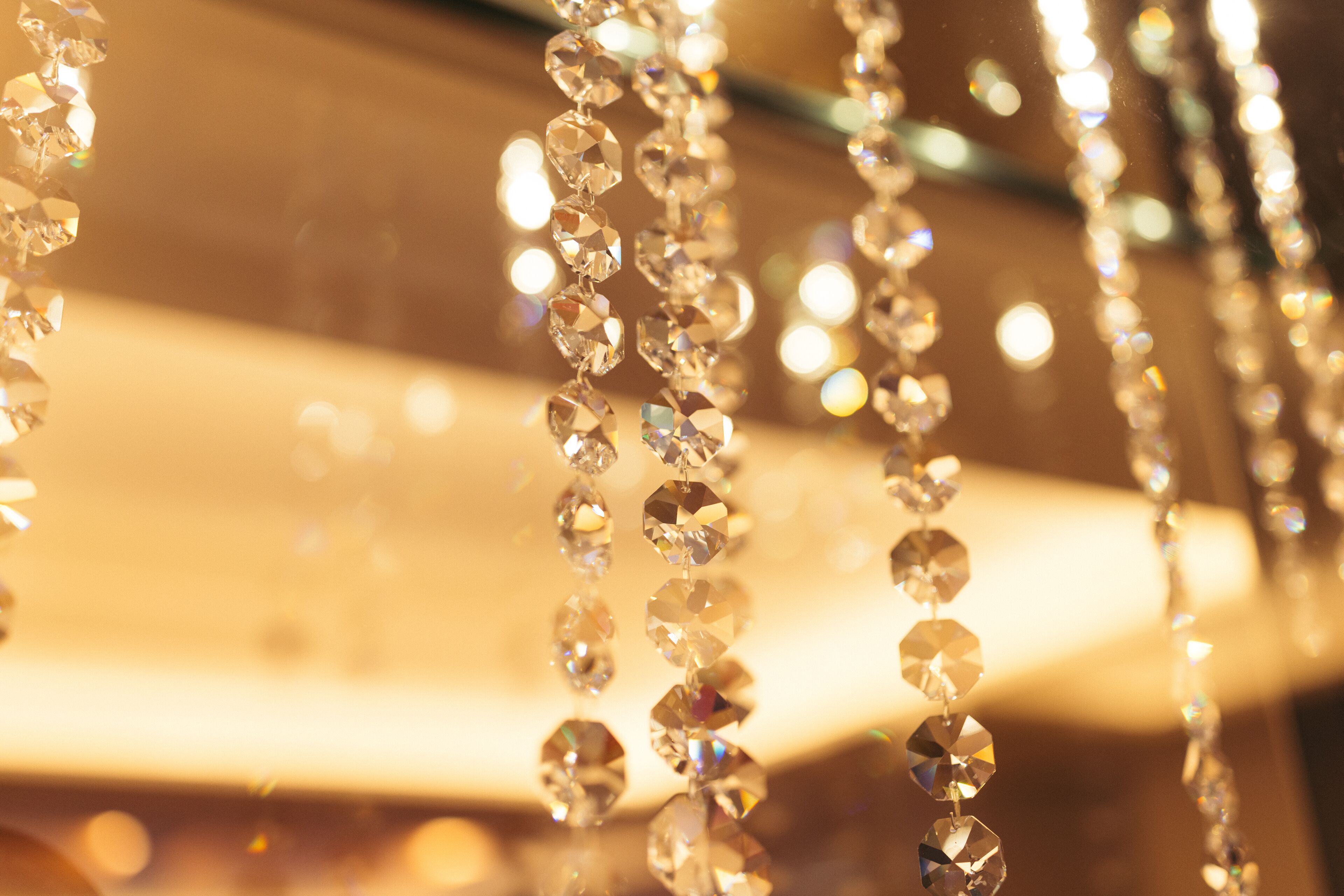 A close-up of hanging crystal decorations.