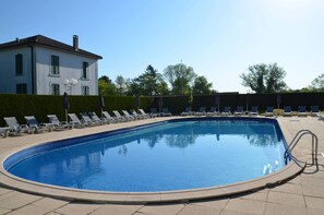 Outdoor pool, pool umbrellas, pool loungers