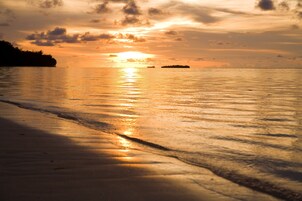 On the beach, white sand