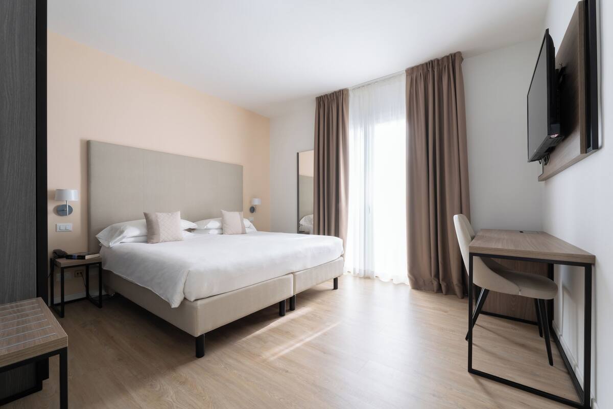 1 dormitorio, ropa de cama de alta calidad, minibar y caja fuerte