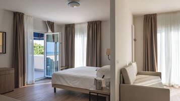 Executive Room, Terrace, Sea View | Premium bedding, minibar, in-room safe, desk