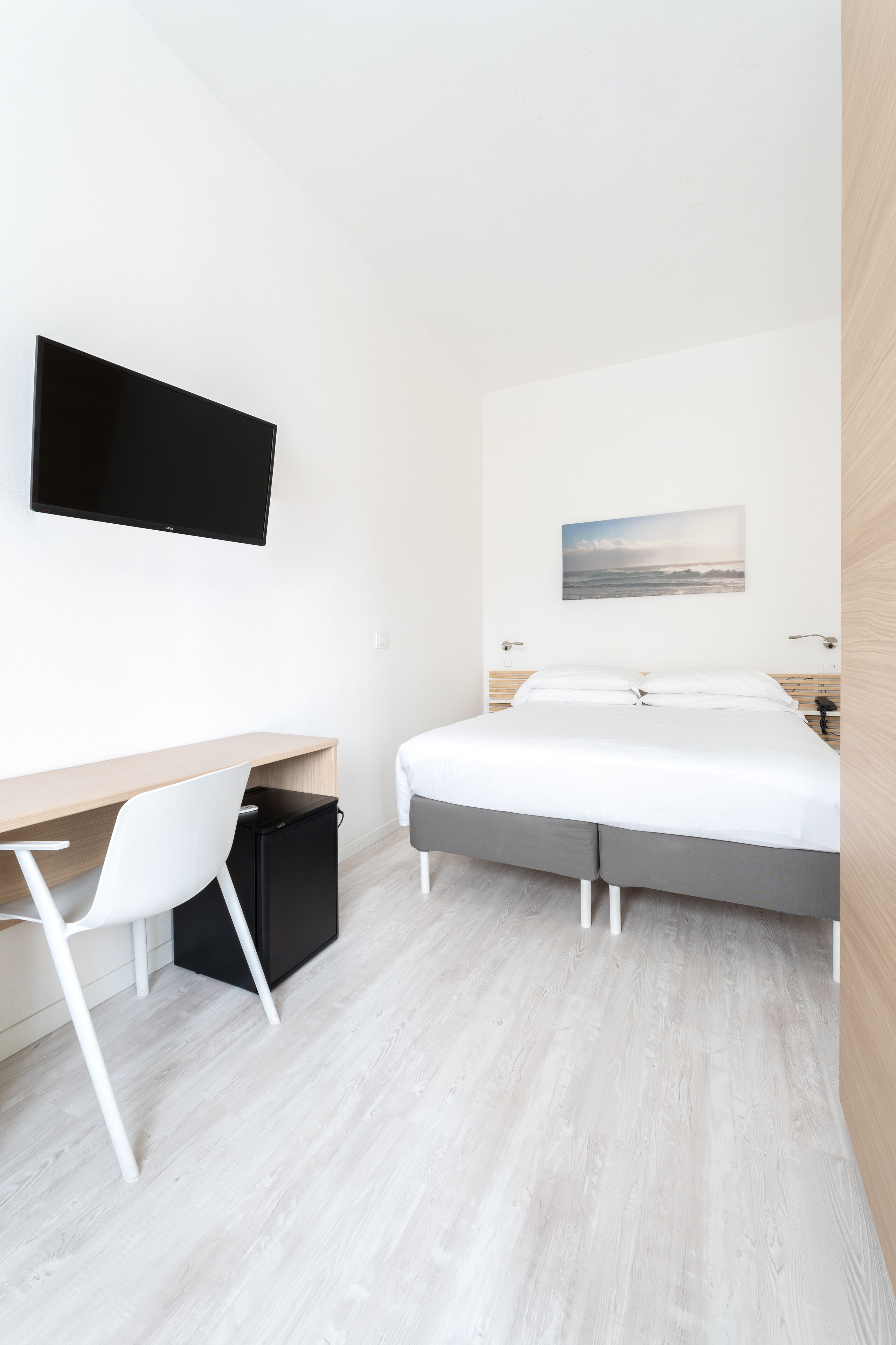 Luxe beddengoed, een minibar, een kluis op de kamer, een bureau