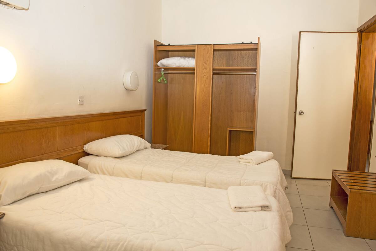 Blackout drapes, iron/ironing board (on request), WiFi (free)