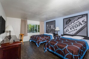 A hotel room with two beds, a desk, a chair, and a window with curtains. - Super 8 by Wyndham Las Vegas North Strip/Fremont St. Area (Las Vegas)