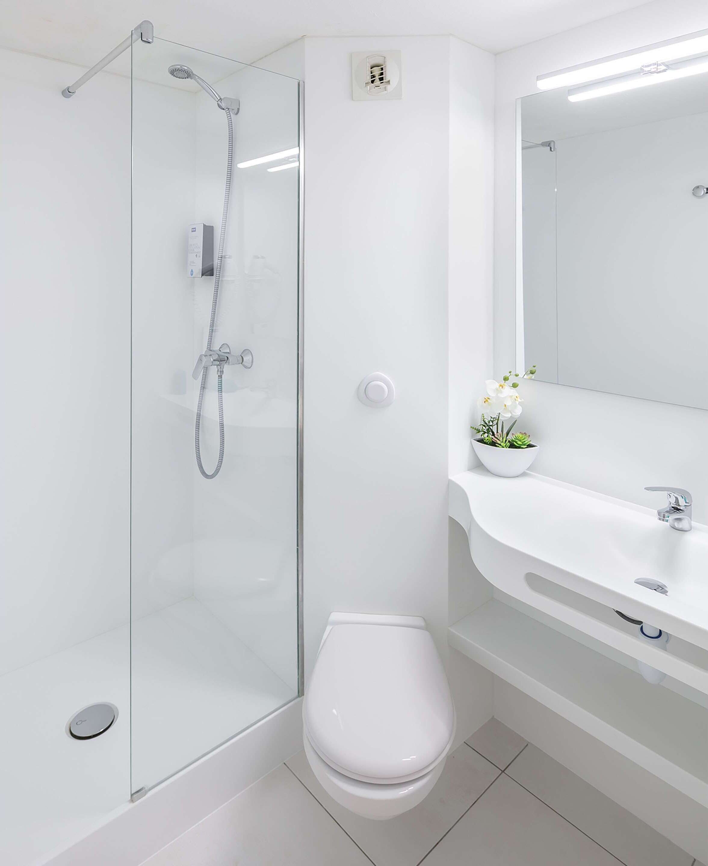 shower, eco-friendly toiletries, hair dryer, towels