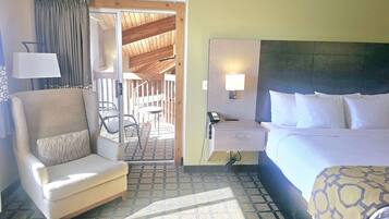 Studio Suite, 1 King Bed, Hot Tub, Pool View | Desk, blackout drapes, iron/ironing board, free cribs/infant beds