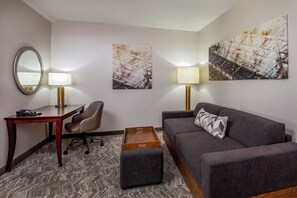 Premium bedding, desk, laptop workspace, blackout curtains