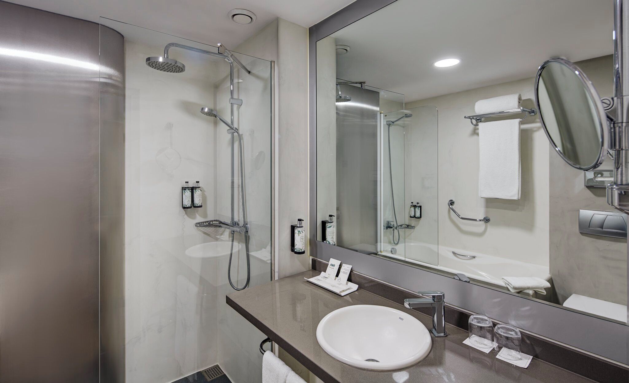 separate bathtub and shower, free toiletries, hair dryer, towels