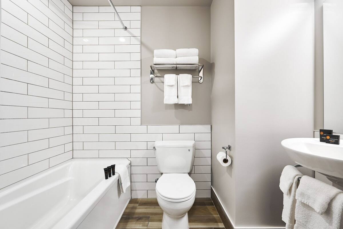 room, 1 king bed with sofa bed, balcony | bathroom | free toiletries, hair dryer, towels