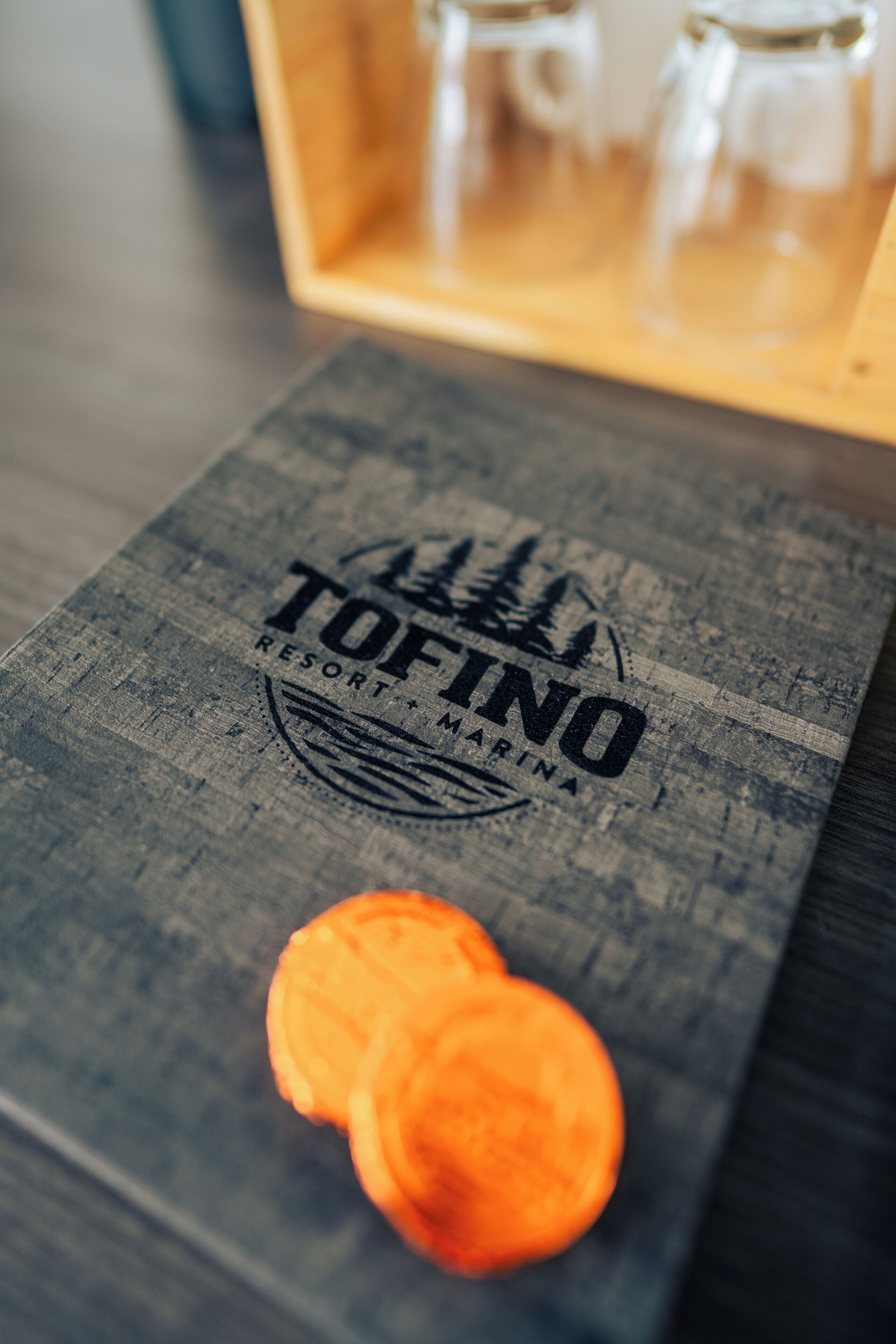 A wooden box with a label that reads "TOFINO RESORT MARINA".