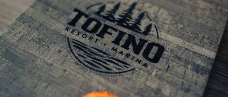 A wooden box with a label that reads "TOFINO RESORT MARINA".