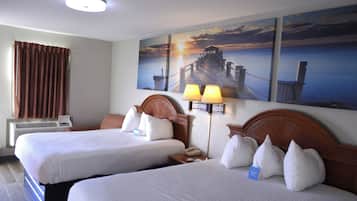 Hypo-allergenic bedding, desk, laptop workspace, blackout drapes