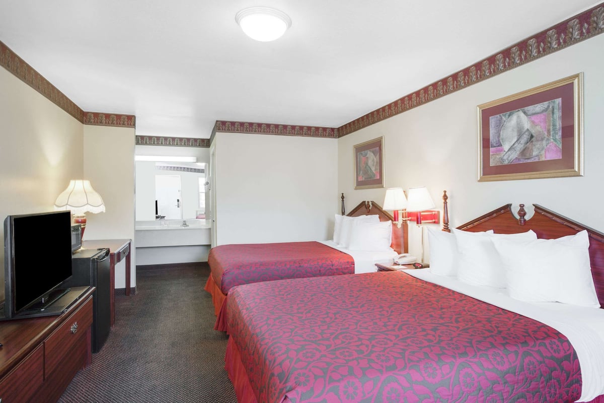 Standard Room, 2 Queen Beds, Non Smoking | Hypo-allergenic bedding, desk, laptop workspace, blackout curtains