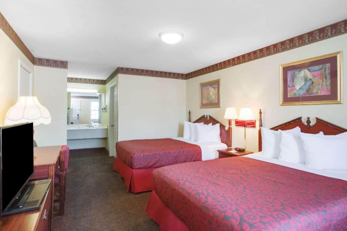 Hypo-allergenic bedding, desk, laptop workspace, blackout curtains
