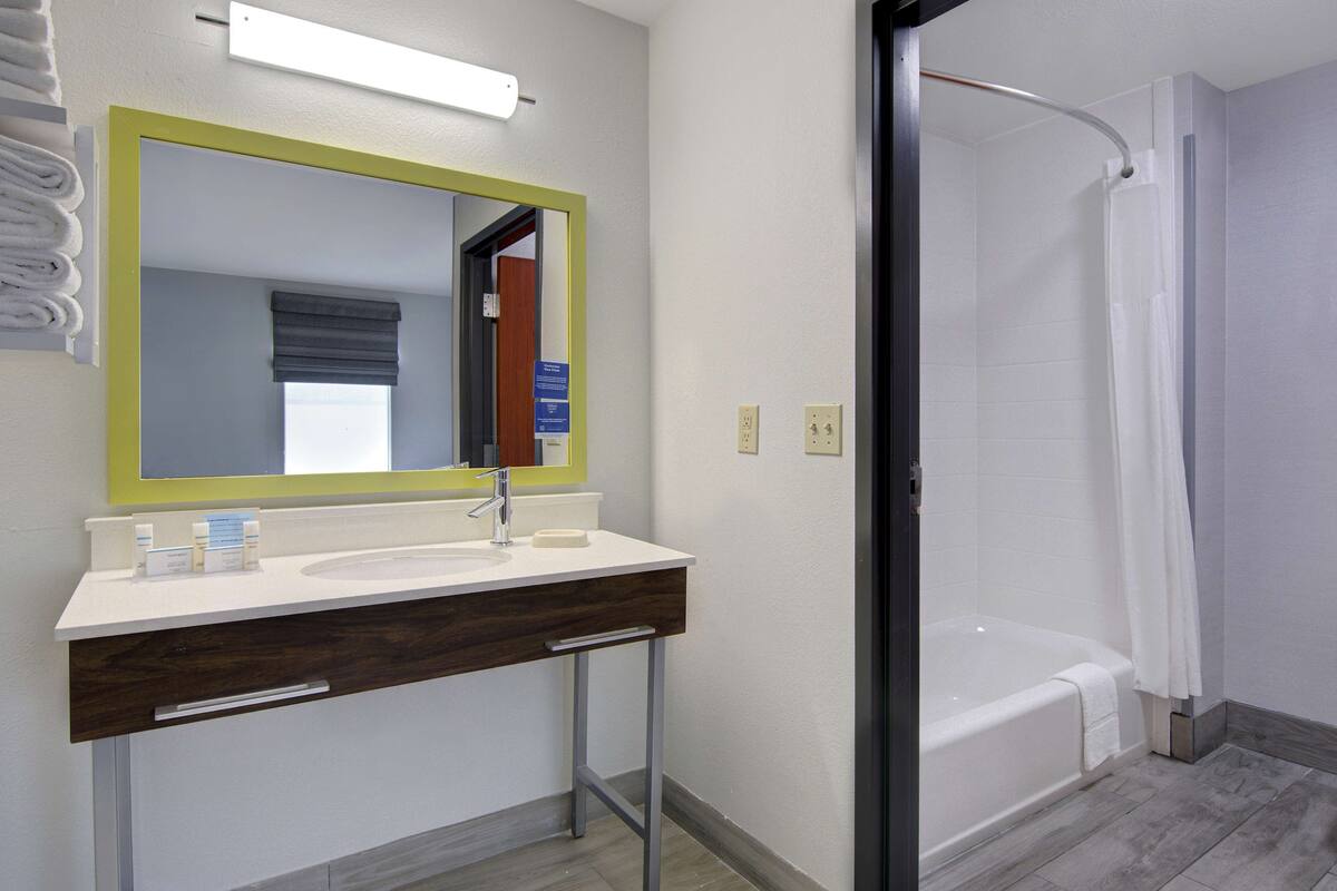 suite, 2 queen beds, non smoking | bathroom | free toiletries, hair dryer, towels