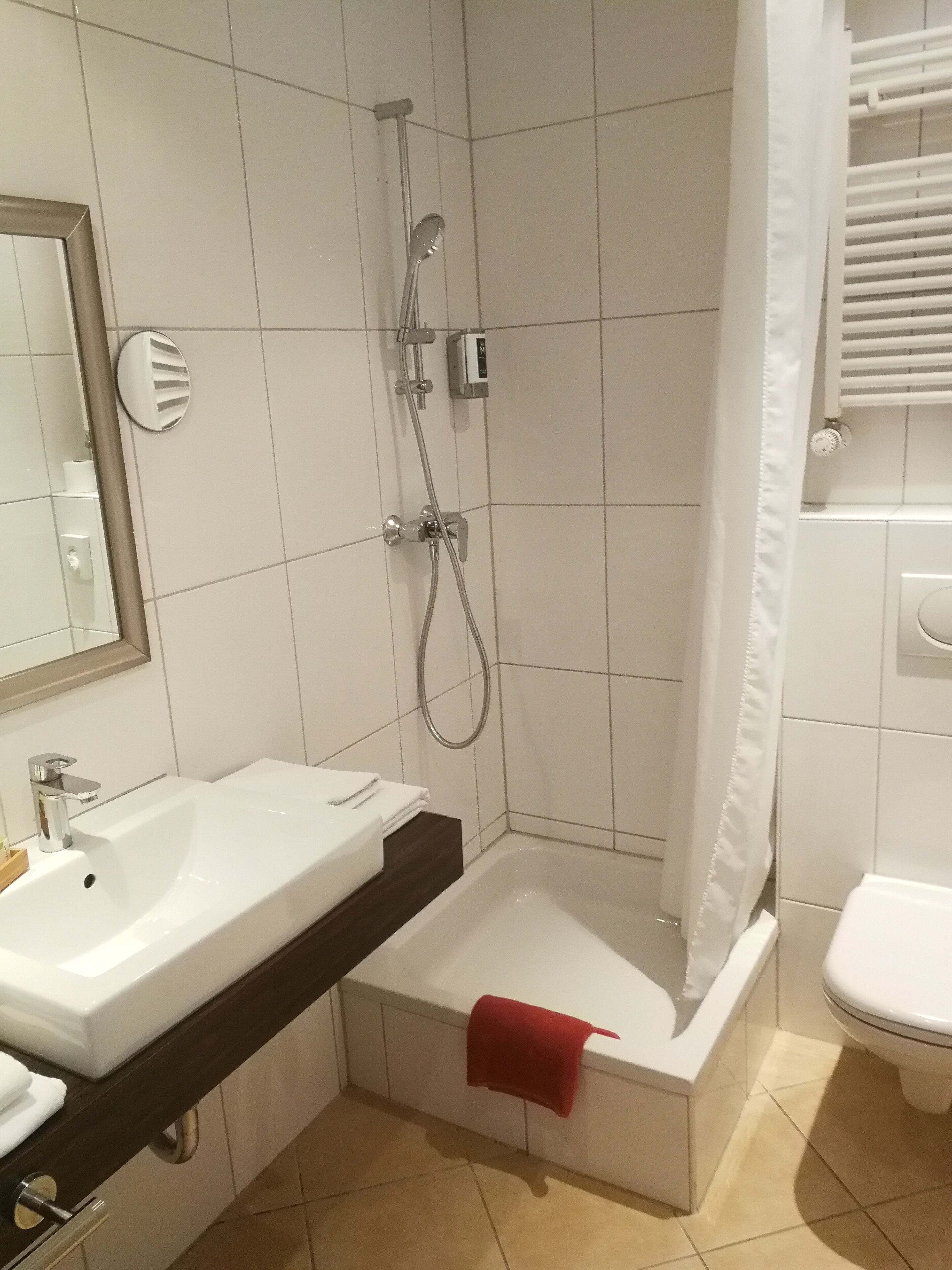 standard double room | bathroom | designer toiletries, hair dryer, towels