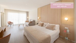 Minibar, coffres-forts dans les chambres, bureau, rideaux occultants