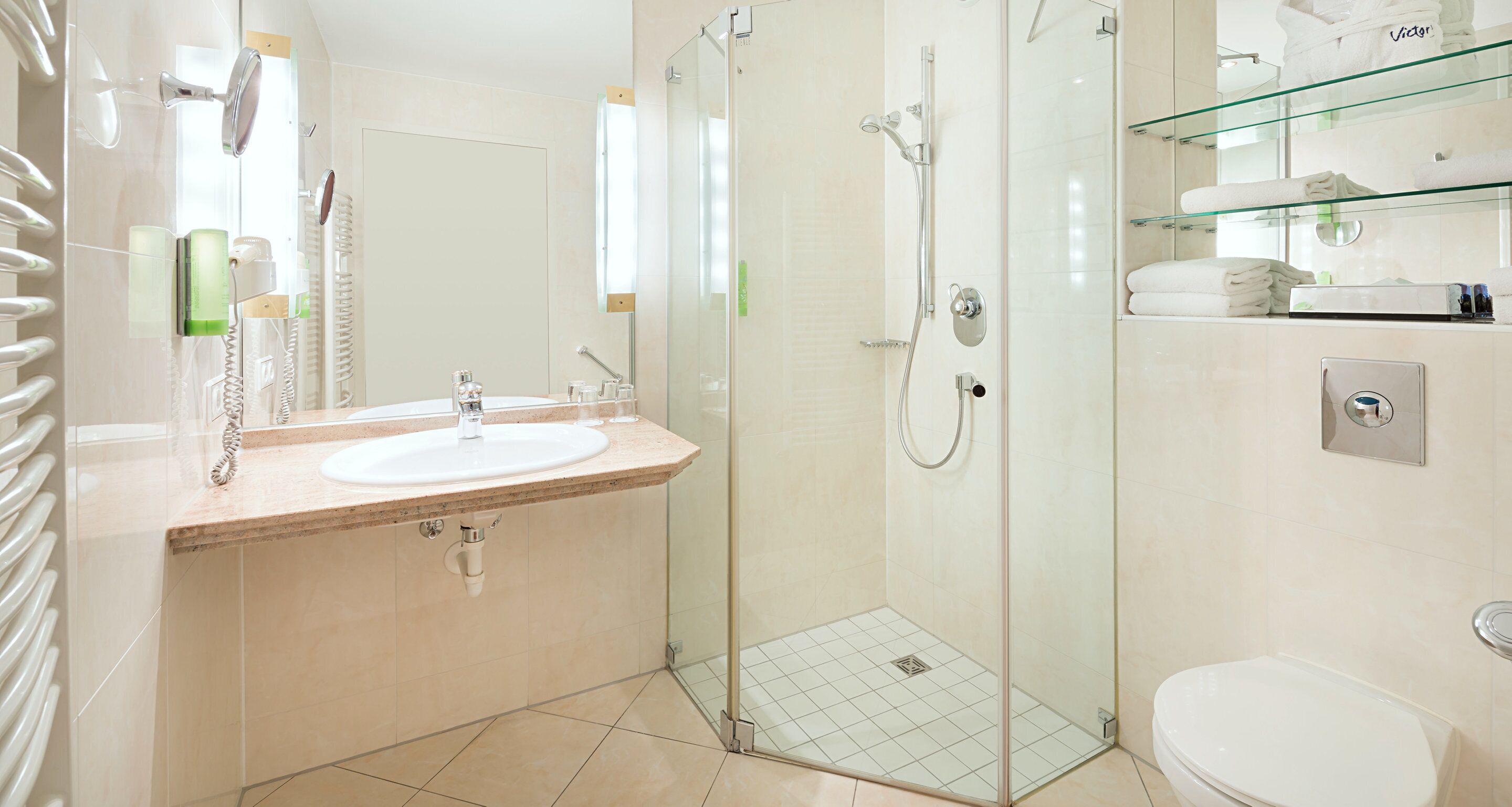 eco-friendly toiletries, hair dryer, towels