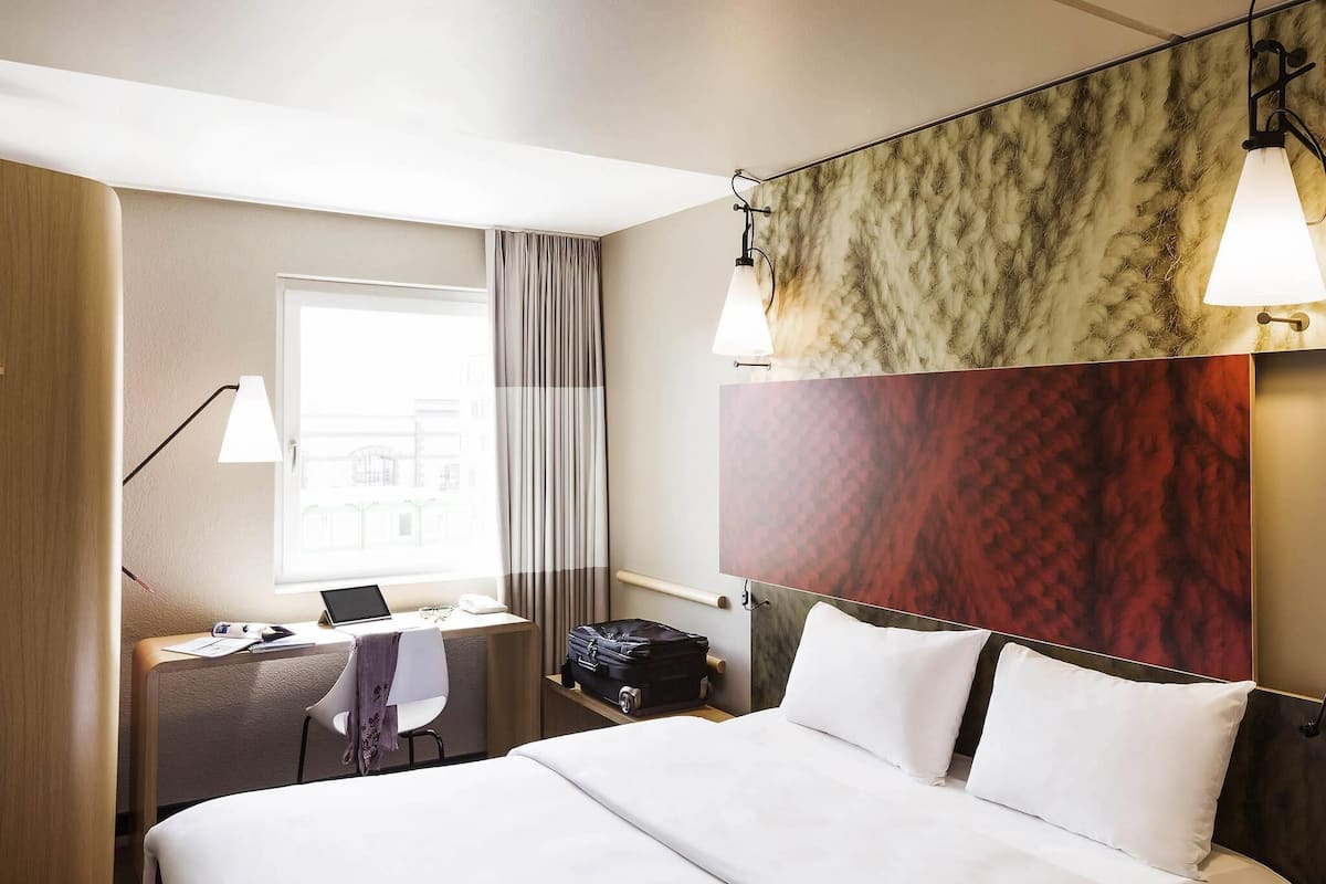 Hypo-allergenic bedding, desk, blackout curtains, soundproofing