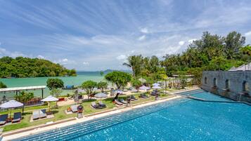 Outdoor pool, open 7:00 AM to 7:00 PM, pool umbrellas, pool loungers