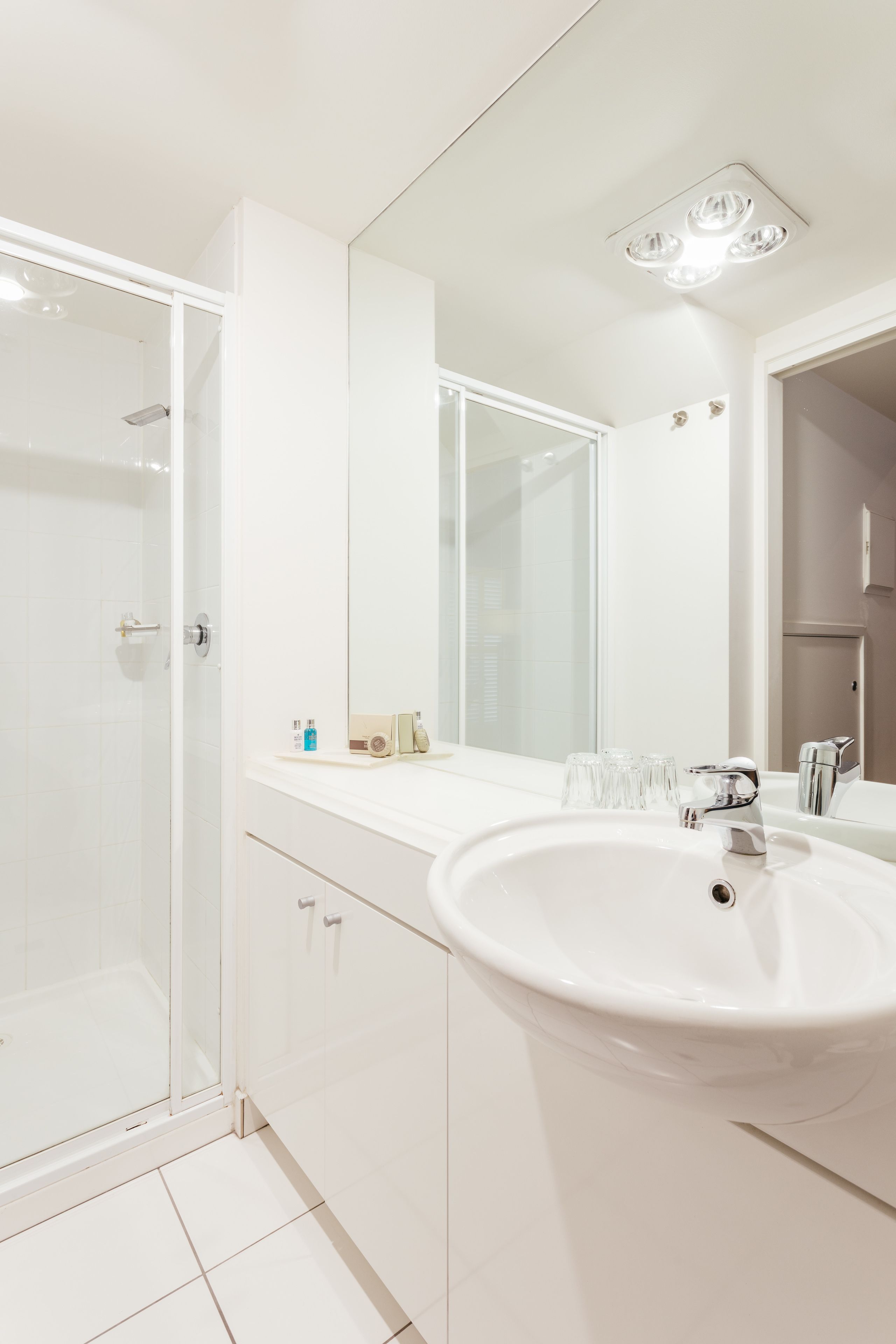 corporate studio | bathroom | shower, designer toiletries, hair dryer, bathrobes