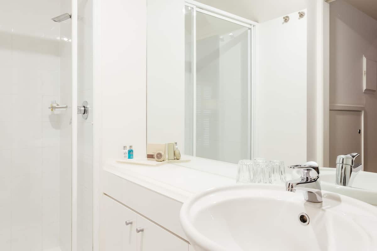 corporate studio | bathroom | shower, designer toiletries, hair dryer, bathrobes